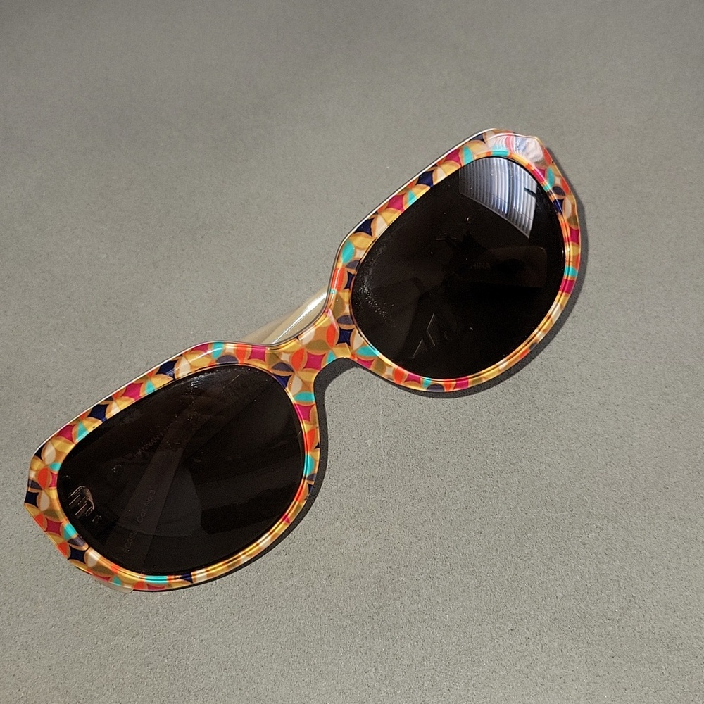 Fossil Sunglasses feature a distinctive multicolor geometric mosaic